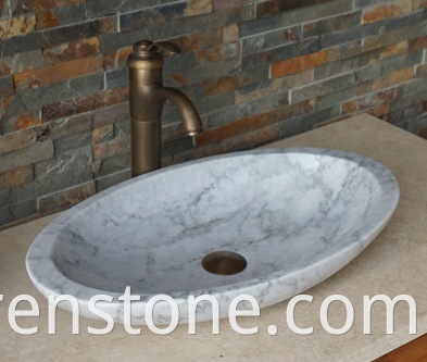 white marble wash basin